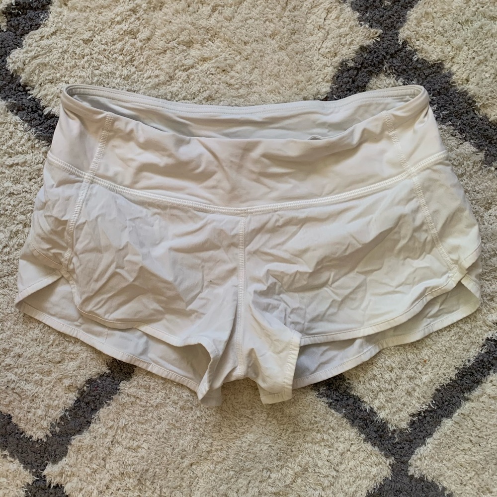 White lulu speed shorts size 4